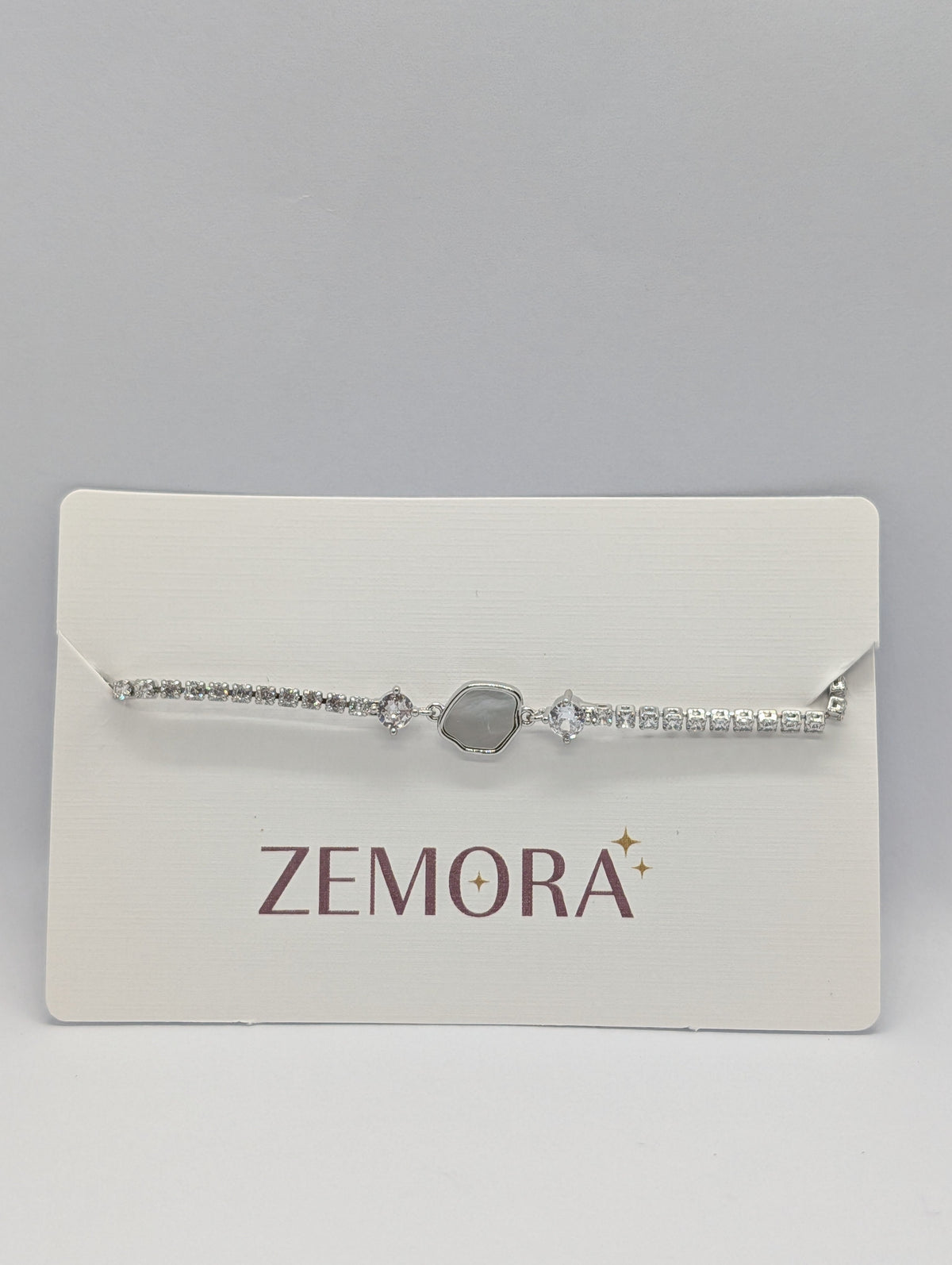 Mother of Pearl Hexagon CZ Tennis Bracelet - Silver tone on Zemora card display