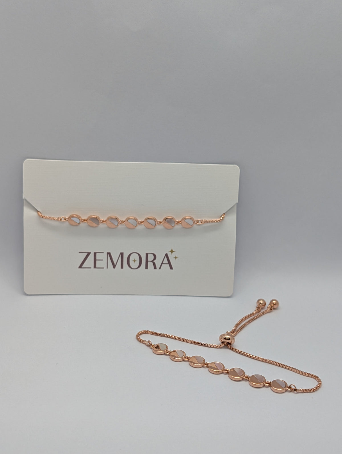 Silver mirror disc station adjustable bracelet on Zemora jewellery card