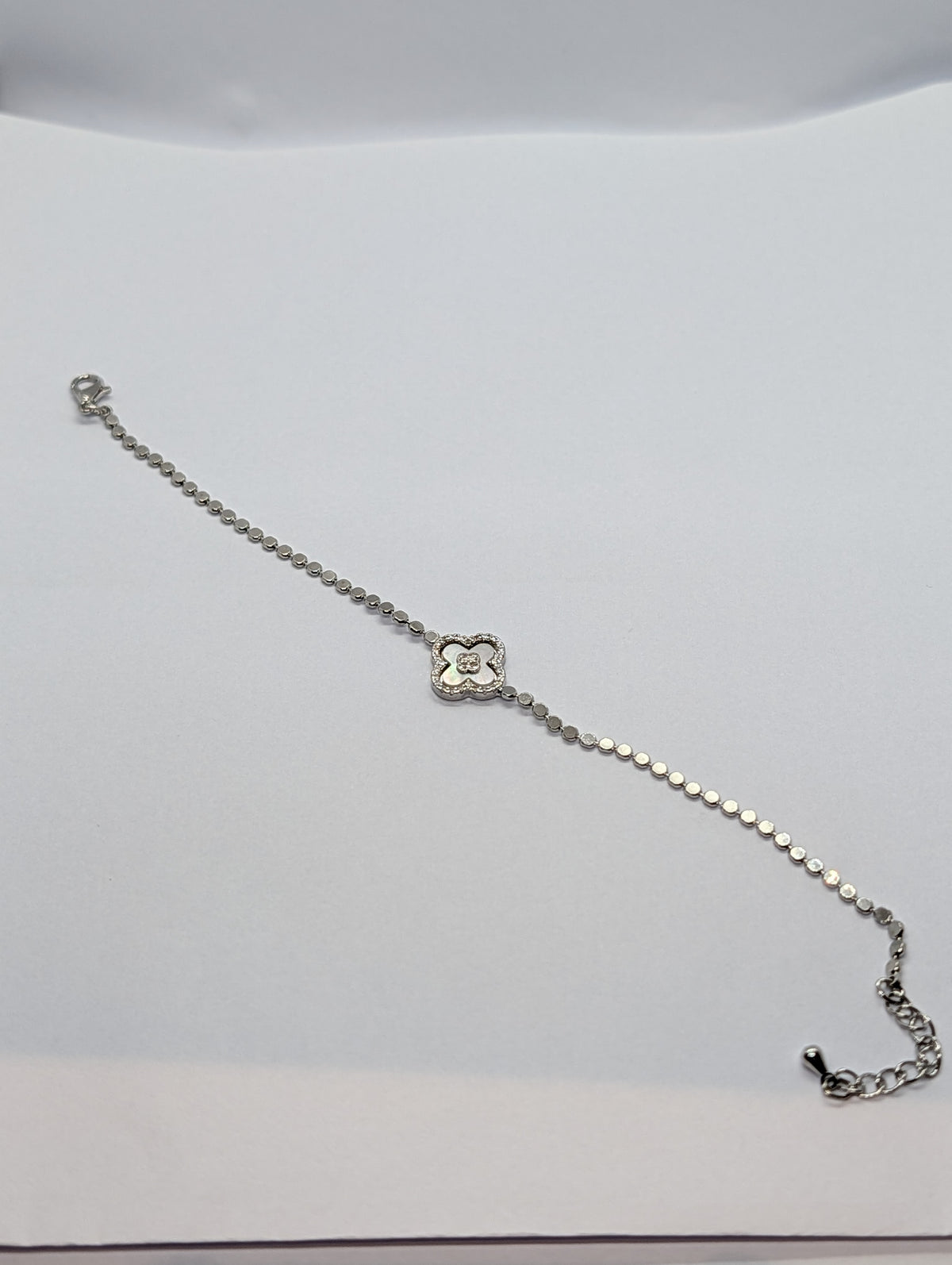 Rose gold pearl clover charm sequin chain bracelet on Zemora jewellery card