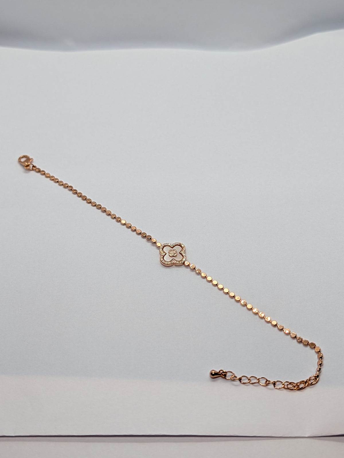 Silver pearl clover charm sequin chain bracelet on Zemora jewellery card