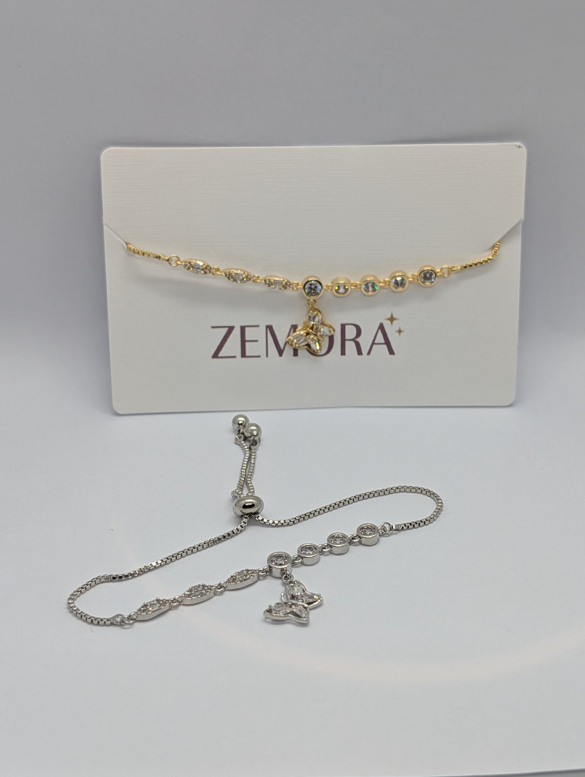 CZ Butterfly Charm Bracelet - Gold and Silver tone comparison