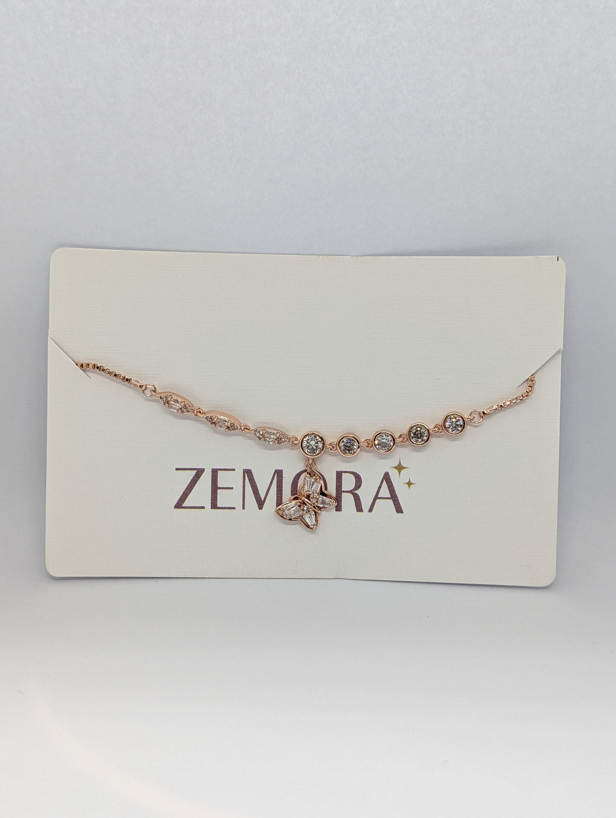 CZ Butterfly Charm Bracelet - Rose Gold tone full view on card