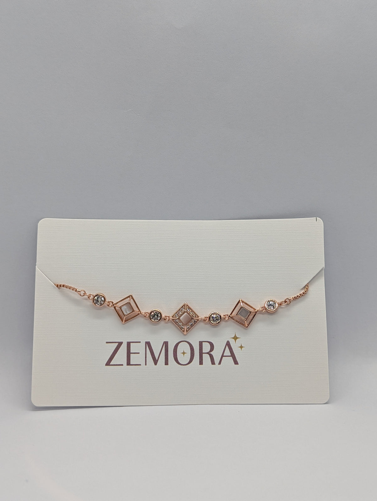 CZ Diamond Shape Station Bracelet - Rose Gold tone on Zemora display card