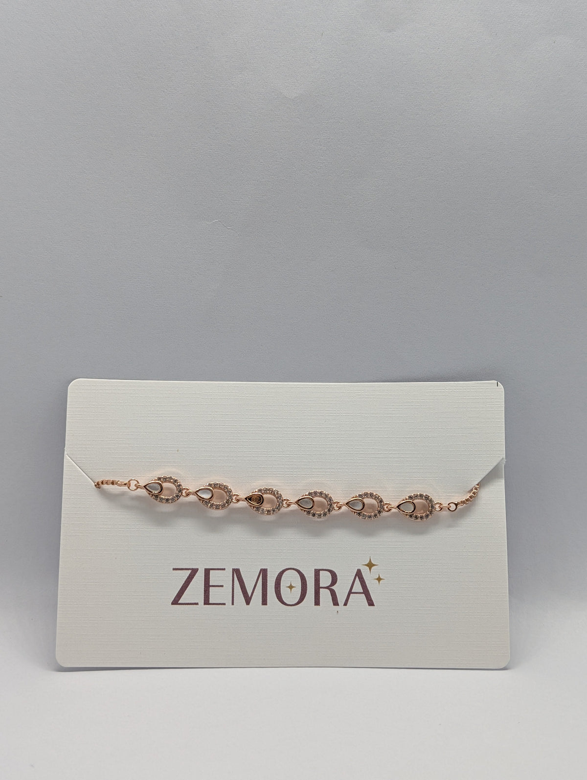 CZ Mother of Pearl Teardrop Link Bracelet - Rose Gold tone on Zemora card display