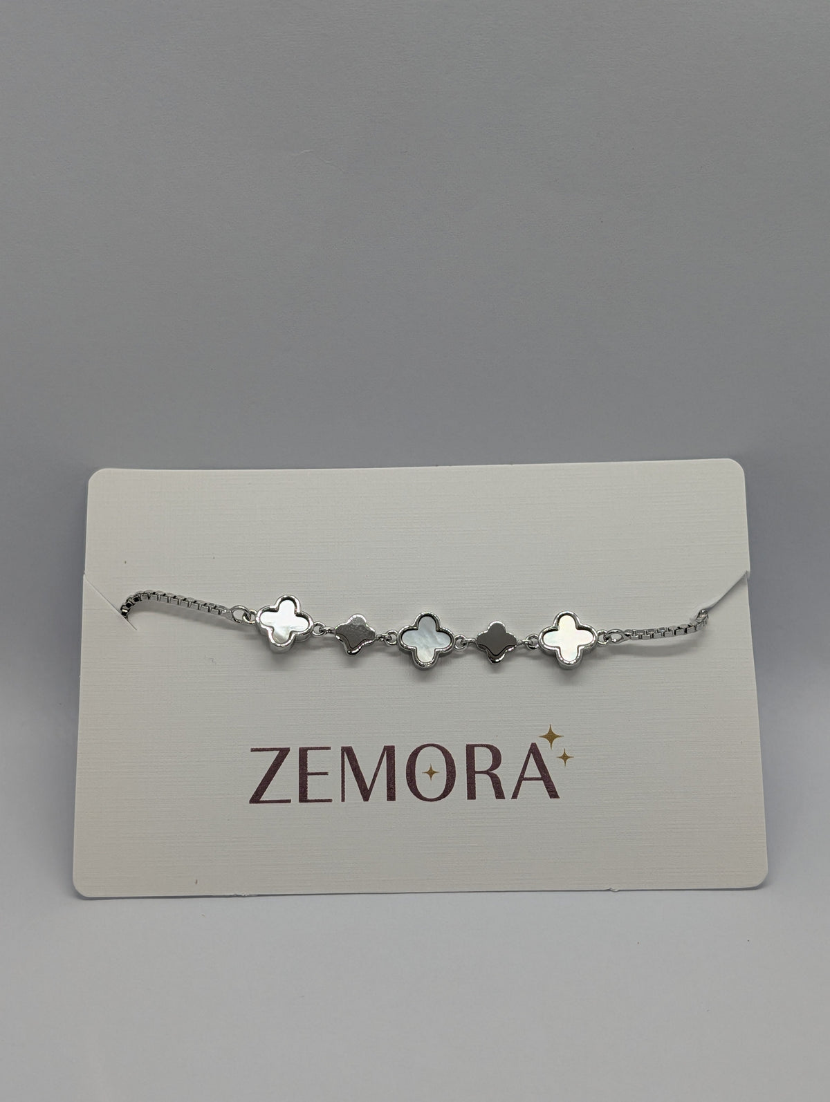 Mother of Pearl Onyx Clover Station Bracelet - Rose Gold tone open layout showing full bolo closure