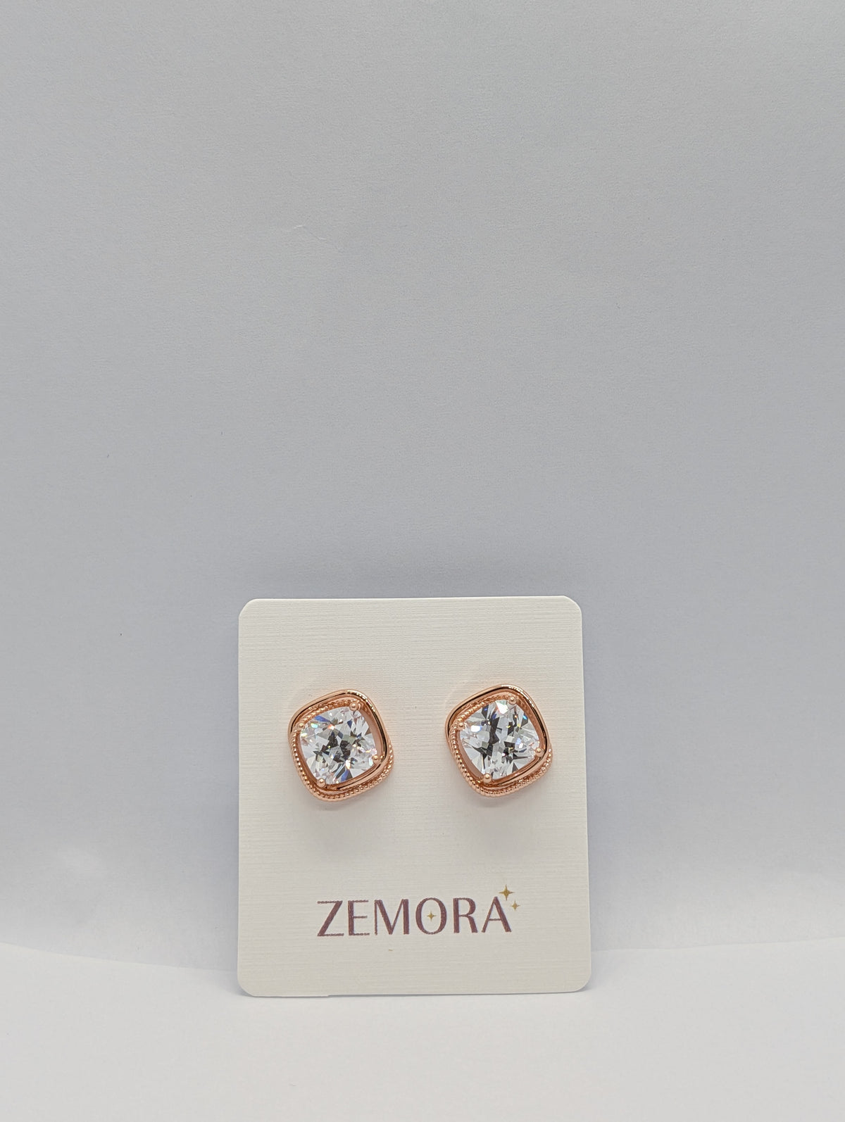 Cushion-Cut CZ Milgrain Stud Earrings - Rose Gold tone on Zemora display card
