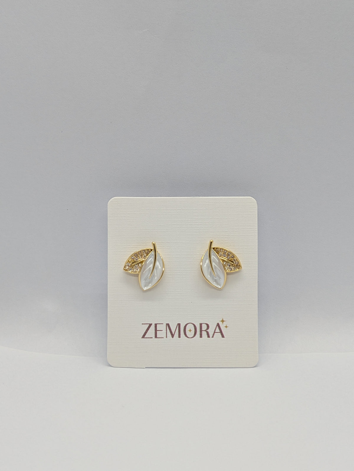 Mother of Pearl CZ Leaf Stud Earrings - Gold tone on Zemora display card