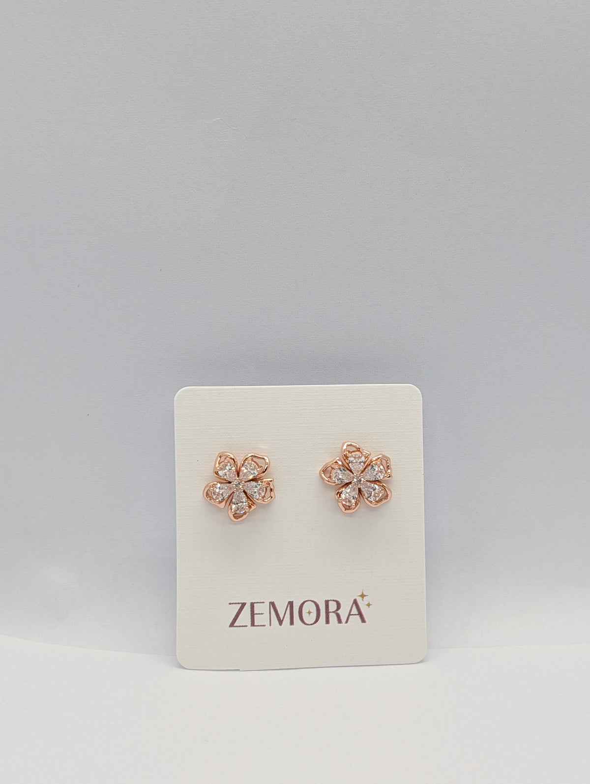 CZ Petal Flower Stud Earrings - Rose Gold tone on Zemora display card