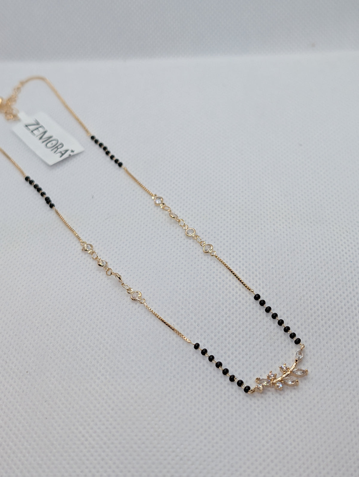 CZ Butterfly Mangalsutra - Gold tone chain detail
