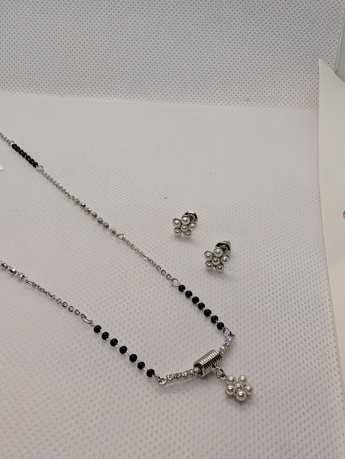 CZ Bar Pearl Flower Cluster Mangalsutra Set - Gold tone pendant detail with earrings