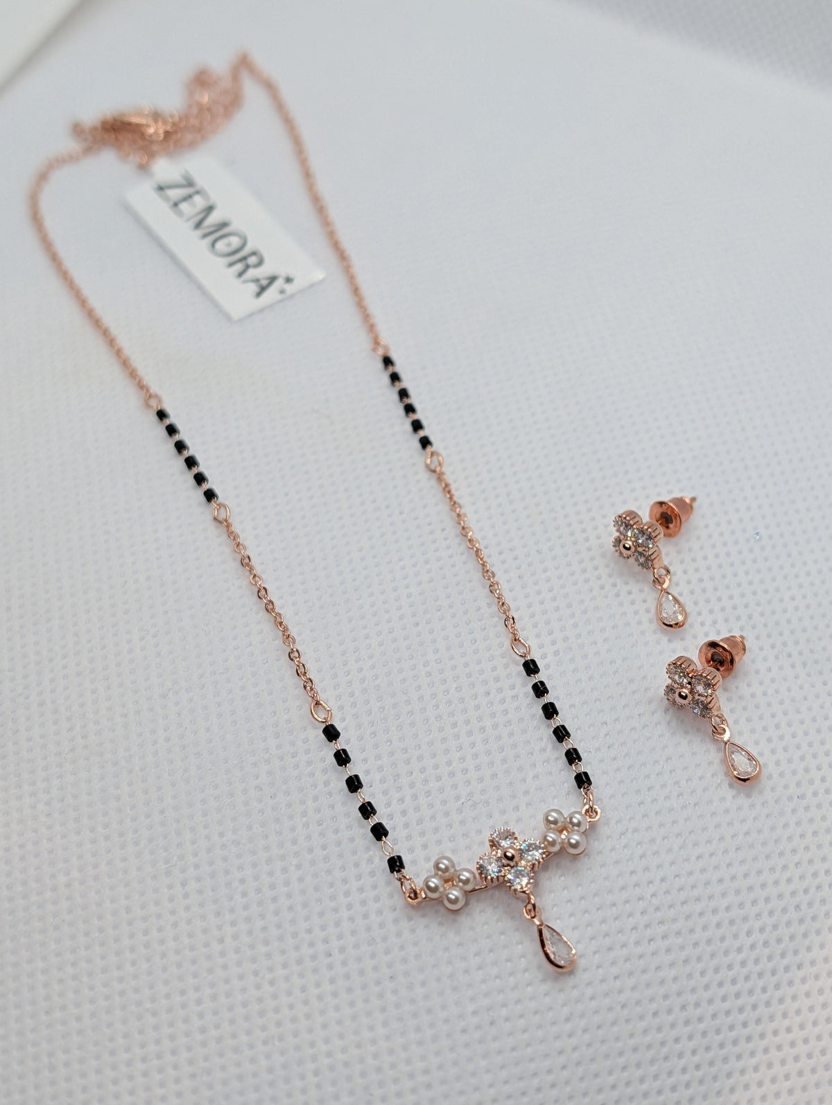 CZ Flower Pearl Cluster Drop Mangalsutra Set - Rose Gold tone pendant detail with earrings