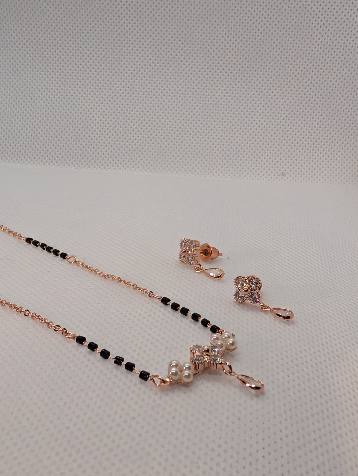CZ Flower Pearl Cluster Drop Mangalsutra Set - Rose Gold tone chain and pendant detail
