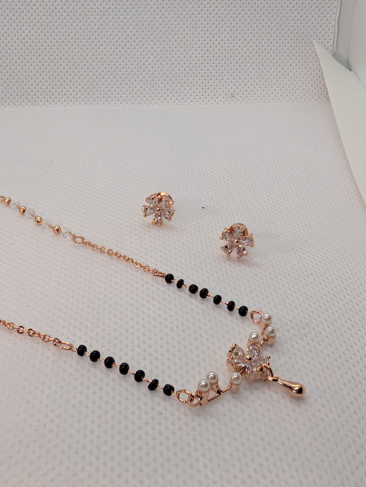 CZ Marquise Flower Pearl Drop Mangalsutra Set - Rose Gold tone pendant and earrings close up