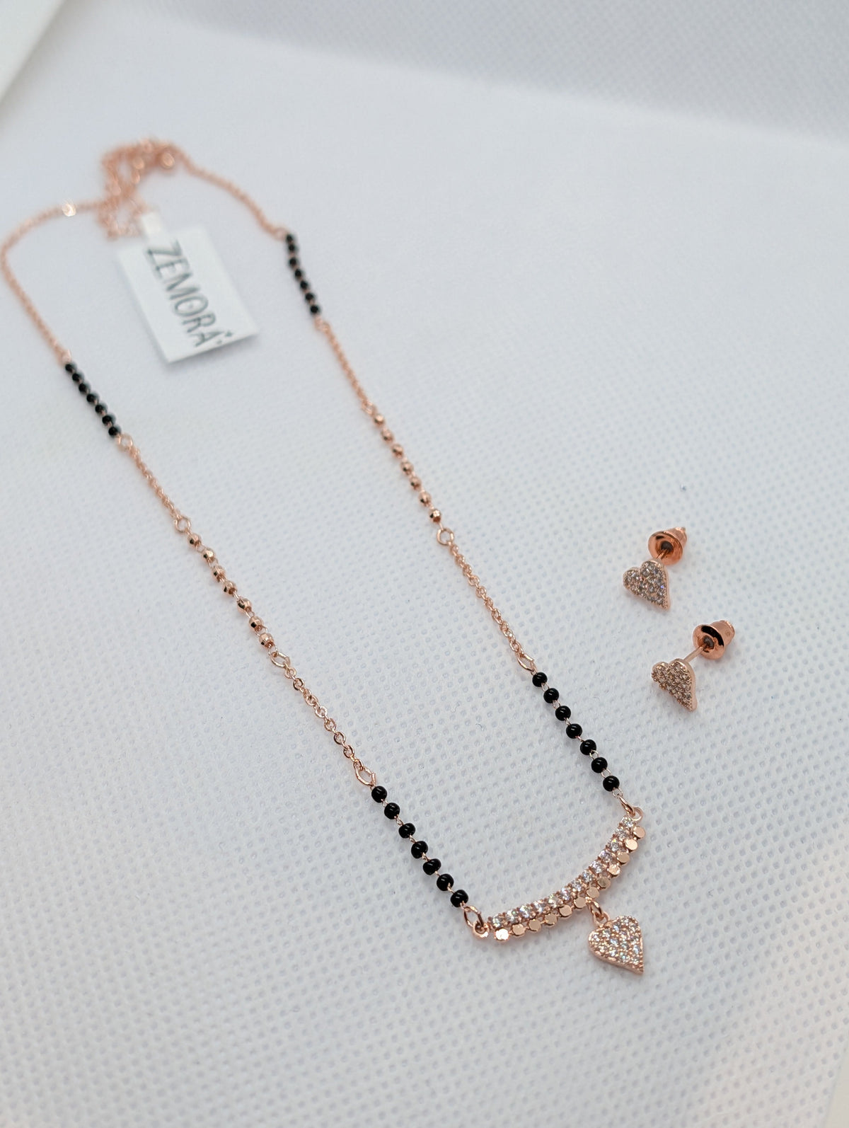CZ Pave Bar Heart Drop Mangalsutra Set - Rose Gold tone full view with earrings on Zemora card