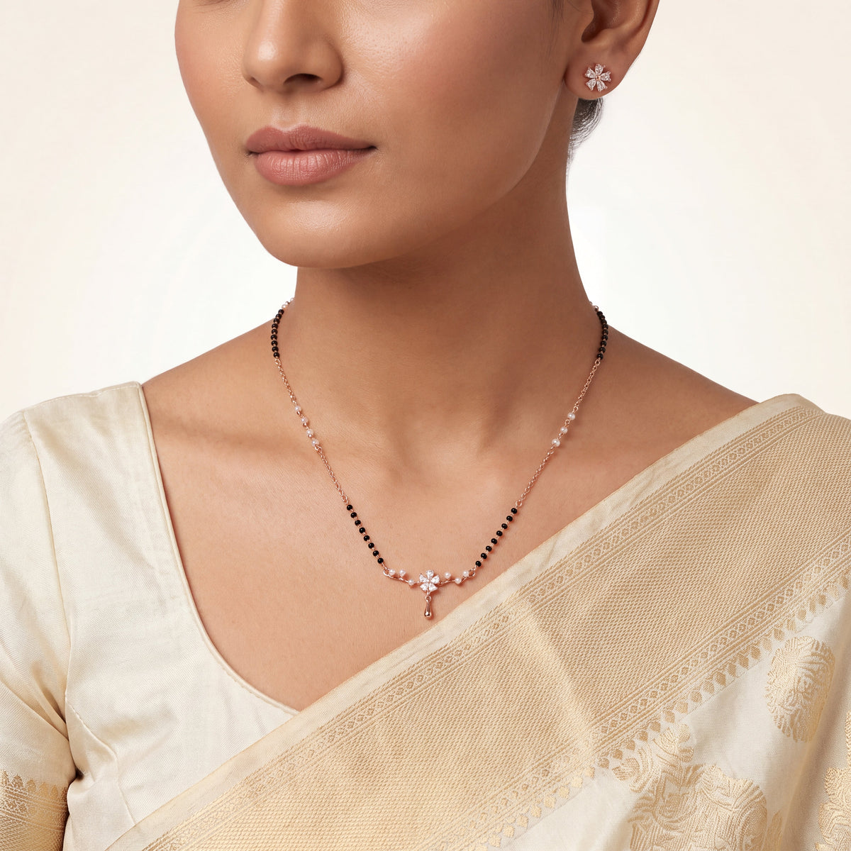 CZ Marquise Flower Pearl Drop Mangalsutra Set - Rose Gold tone worn on model with saree