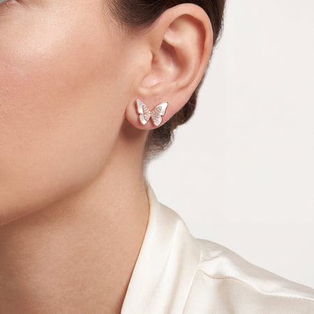 Mother of Pearl Pave CZ Butterfly Stud Earrings - Rose Gold worn on model's ear